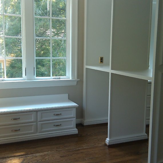 Hanging Clothing Peninsula and Window Seat Belle Meade Bedroom to Master Dressing Room Conversion - The Closet Company