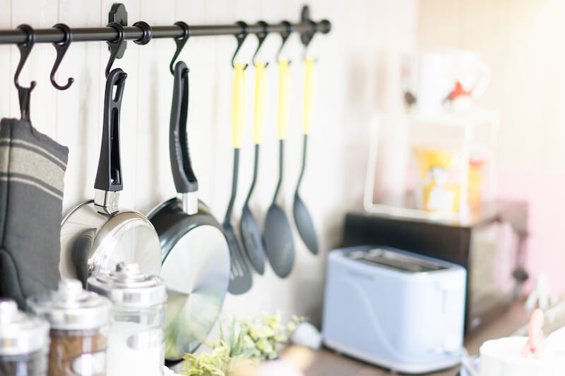 Kitchen equipment are hung on the wall - The Closet Company